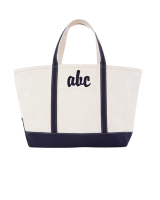 Large Classic Tote in Safari featuring durable heavyweight canvas, reinforced shoulder straps, a front slip pocket, and a spacious interior.