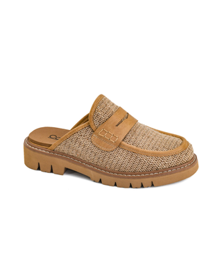 Am I Right Raffia Mule featuring a woven raffia upper, tan penny loafer detail, and lightweight lug sole.