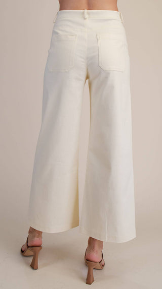 Back of high waisted wide leg creme color trouser pants 