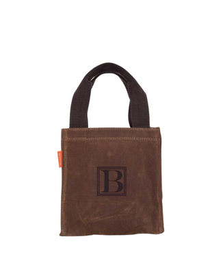 Beer Carrier in Khaki featuring durable waxed canvas, sturdy webbed carry handles, and a personalized monogram on the front, designed for carrying beer bottles or canned beverages.