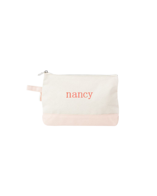 Canvas Makeup Bag in Powder Pink featuring a zip-top closure, durable heavyweight canvas, and compact design for organizing cosmetics and travel essentials.