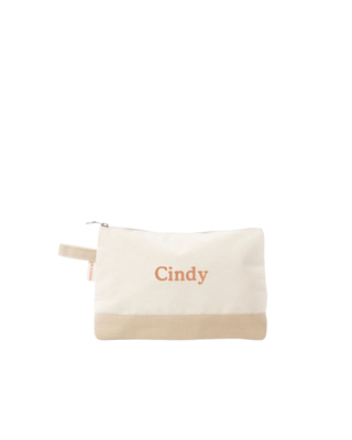 Canvas Makeup Bag in Safari featuring a zip-top closure, durable heavyweight canvas, and compact design for organizing cosmetics and travel essentials.