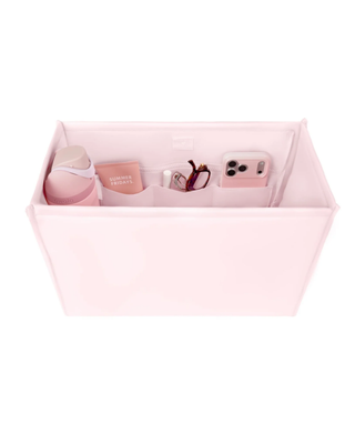 Ballet pink tote bag organizer insert with multiple interior pockets holding a water bottle, phone, sunglasses, cosmetics, and everyday essentials.