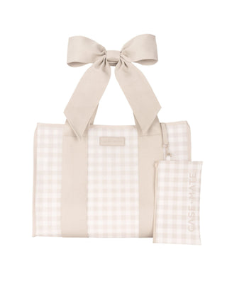 Latte Gingham Bow Jelly Tote in waterproof TPU with oversized bow straps, spacious interior, and neutral gingham pattern for travel, work, beach, and everyday use.