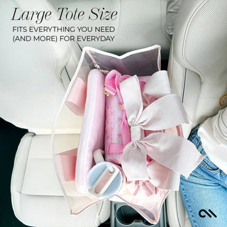 Case-Mate Afternoon Rosé Bow Jelly Tote packed with daily essentials, showing its spacious interior.