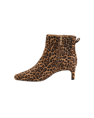 Women’s leopard print suede-look ankle bootie with rounded toe, ankle-height silhouette, and mid-height block heel.