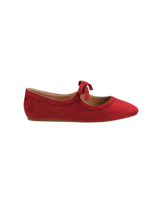 Women’s red suede-look ballet flat with statement bow detail, rounded toe, and low-profile sole.