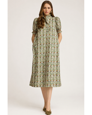 Cream botanical floral midi dress with green, blue and rust print, ruffled neckline, puff sleeves and side pockets.