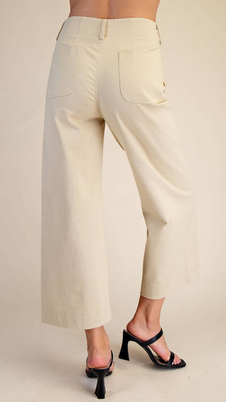 back of beige high waisted wide legged cropped pants