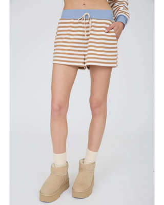 Women’s camel and cream horizontal striped knit lounge shorts with a light blue ribbed waistband, cream drawstring, and side pockets.