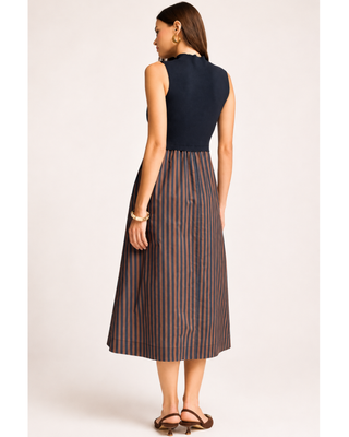 Navy sleeveless mock-neck mixed-media midi dress with a gathered brown and navy striped skirt and side pockets.