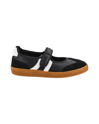 Black and white Mary Jane sneaker with adjustable strap, contrast side stripes, suede-style accents, and gum rubber sole.