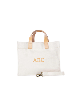 Mini Advantage Bag featuring natural heavyweight canvas, genuine leather handles, detachable shoulder strap, and spacious organized interior.