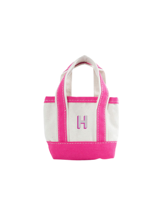 Mini Classic Tote in Hot Pink featuring durable heavyweight canvas, reinforced navy handles, an open-top design, and a personalized embroidered pencil motif on the front.