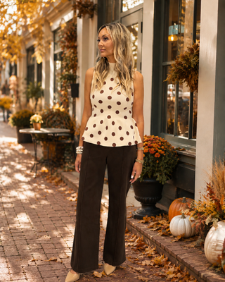 Women's mocha brown high-rise wide-leg cropped pants featuring functional back patch pockets and a modern ankle-length silhouette.