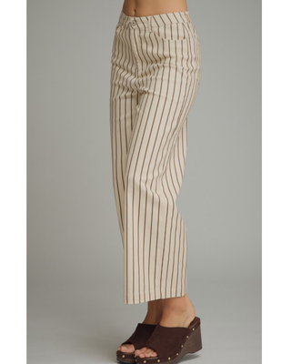 Women's cream straight-leg pants with mocha brown pinstripes, high-rise waist, cropped ankle-length fit, and functional front pockets.