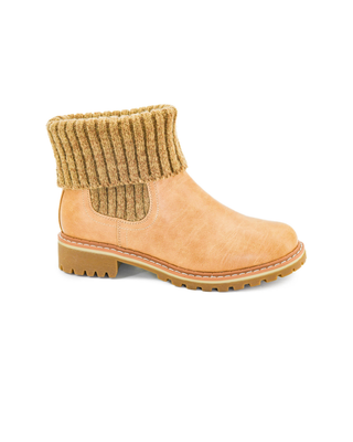 Quiver knit cuff bootie featuring a tan faux leather upper, ribbed sweater cuff, slip-on design, and lightweight lug sole.