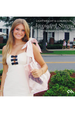 Woman carrying the Case-Mate Afternoon Rosé Bow Jelly Tote outdoors.