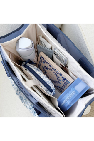 Case-Mate French Vanilla Jelly Tote Organizer inside a navy tote with a water bottle and accessories.