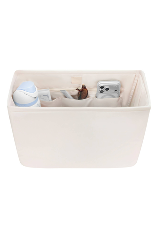 Case-Mate French Vanilla Jelly Tote Organizer holding a water bottle, phone, and everyday essentials.