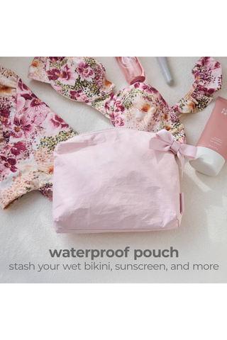 Case-Mate Ballet Pink Bow Crinkle Makeup Bag inside a floral tote, highlighting its waterproof material.