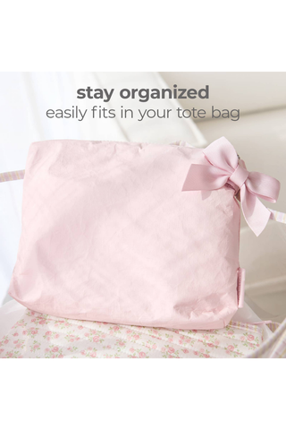 Case-Mate Ballet Pink Bow Crinkle Makeup Bag stored inside a tote for easy organization.