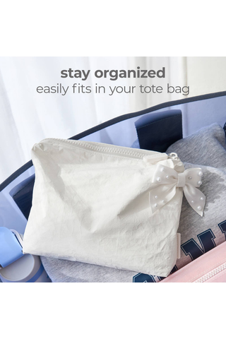Case-Mate Ivory Pearl Bow Crinkle Makeup Bag stored inside a tote for easy organization.
