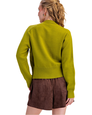 Women's chartreuse green knit cardigan with fabric-covered buttons, crew neckline, long sleeves and ribbed trim.