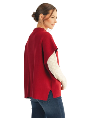 Women’s burgundy knit mock neck sweater with short sleeves, relaxed oversized silhouette, side slits and high-low hem.