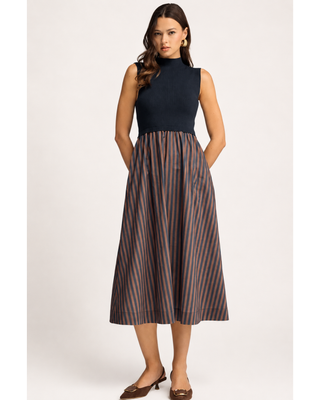 Navy sleeveless mock-neck mixed-media midi dress with a gathered brown and navy striped skirt and side pockets.