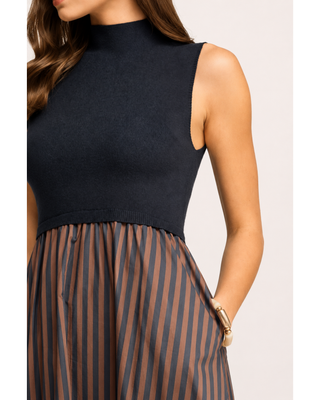 Navy sleeveless mock-neck mixed-media midi dress with a gathered brown and navy striped skirt and side pockets.