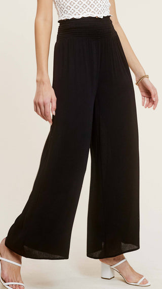 Smocked high waisted wide legged lightweight flowy pants in black
