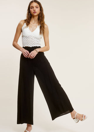 Smocked high waisted wide legged lightweight flowy pants in black