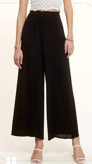 Smocked high waisted wide legged lightweight flowy pants in black