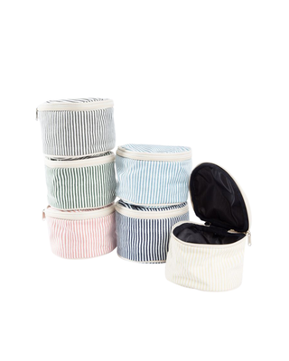 Stripes Circle Case featuring a classic striped canvas design, structured round shape, and zip-around closure.