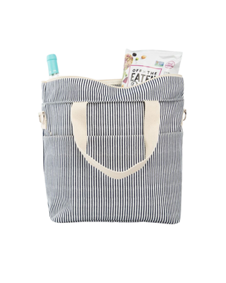 Stripes Cooler Tote in navy stripe featuring an insulated interior, front slip pocket, shoulder straps, removable crossbody strap, and spacious cooler compartment.