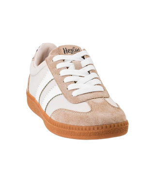 Women’s cream and tan retro sneaker with gold accents, white stripes, leopard print heel detail, white laces and gum sole.