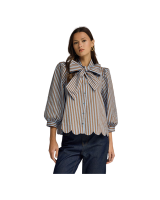Women’s blue and brown striped button-front blouse with oversized bow neckline, three-quarter puff sleeves and scalloped hem.