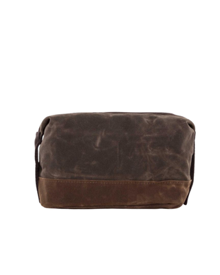 Waxed Dopp Kit in Olive featuring durable waxed canvas, reinforced contrasting base, zip-top closure, and side carry handle.