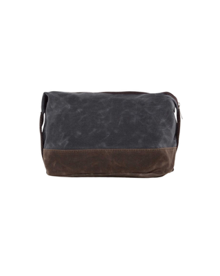 Waxed Dopp Kit in Slate featuring durable waxed canvas, reinforced contrasting base, zip-top closure, and side carry handle.