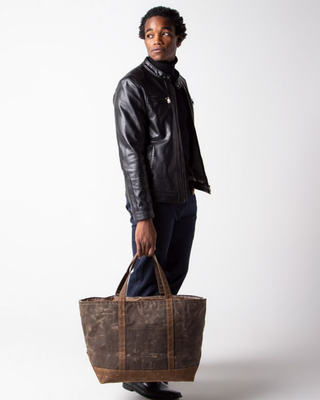 Waxed Large Classic Tote in Olive featuring premium waxed canvas, reinforced shoulder straps, a front slip pocket, and a spacious open interior.