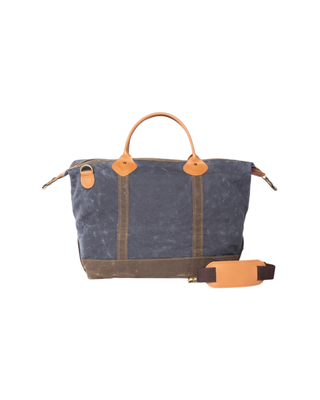 Waxed Weekender in Navy featuring premium waxed canvas, genuine leather handles, removable shoulder strap, and a spacious zip-top travel compartment.